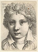 Head of a young girl wearing a jeweled headdress