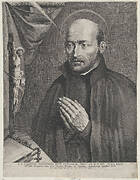 Saint Ignatius of Loyola, praying towards the left with a crucifix, a rosary, a book, and a skull on the table in front of him