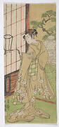 Kabuki actor holding up a lantern