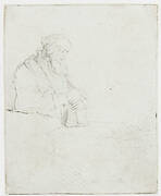 Old man in meditation, leaning on a book