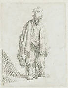 Beggar in a high cap, standing and leaning on a stick