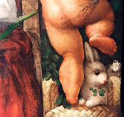 A cherub's legs with a rabbit. A detail of the intrados outer band of St. Gertrude's Chapel