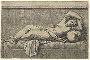 Cleopatra lying partly naked on a bed