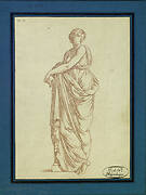 Woman standing leaning on a column